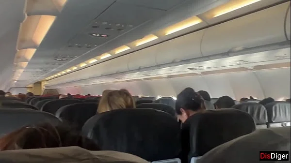 Risky public blowjob on a plane - we got caught!